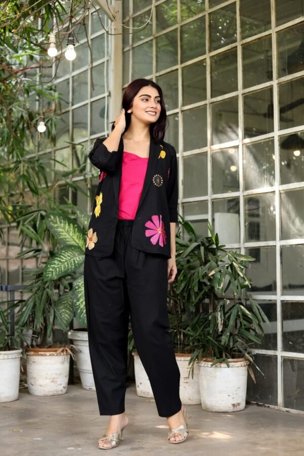 features a blazer jacket,inner and straight trousers