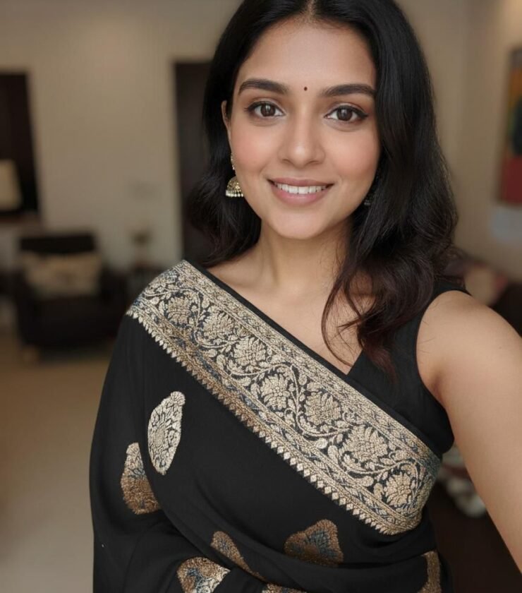 crafted in a fabric with a smooth saree